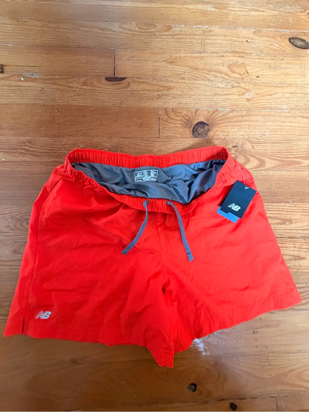 New Balance Men’s Tempo Orange Red Athletic Shorts